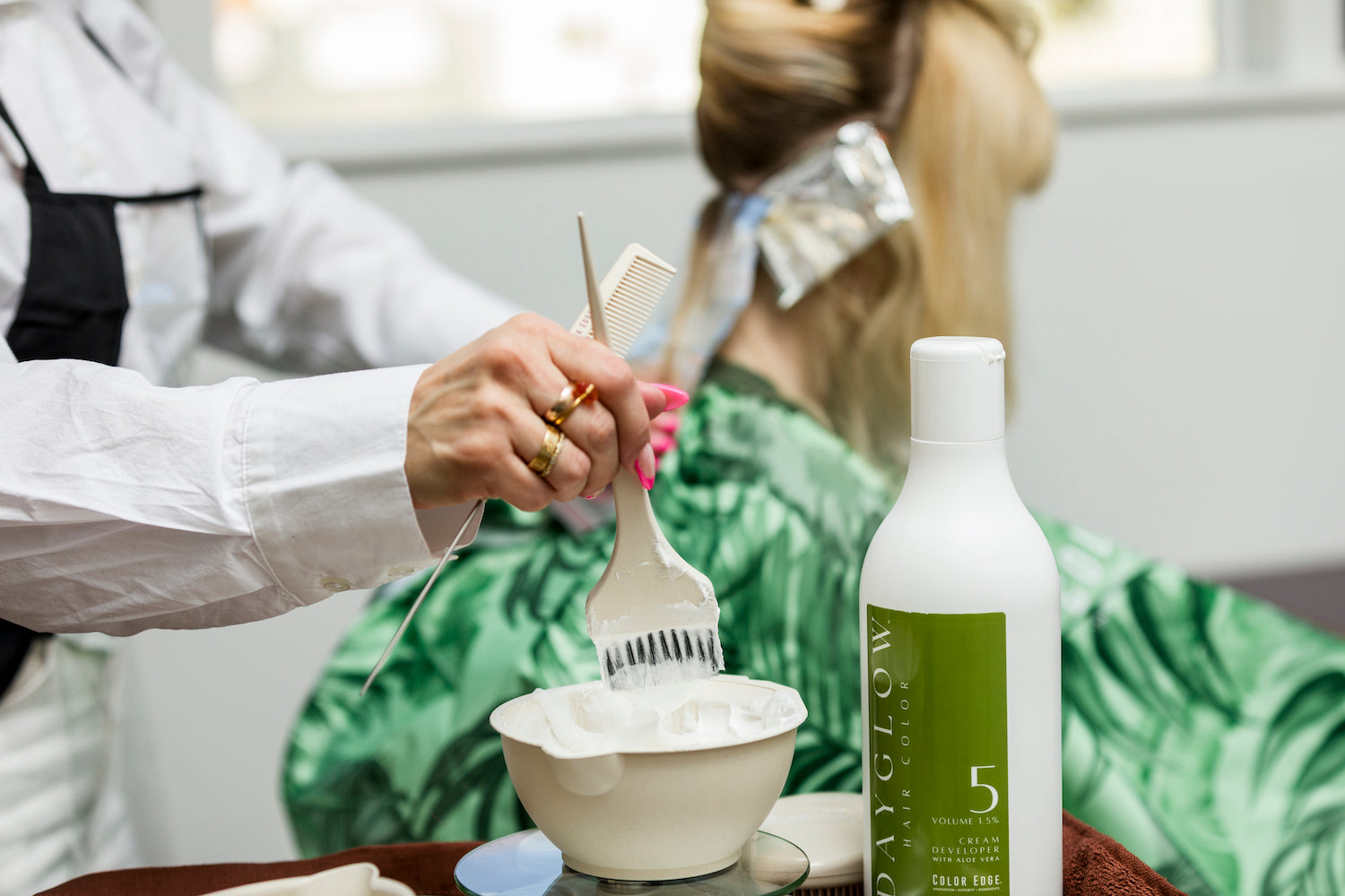 Stylist using Dayglow Developer 5vol