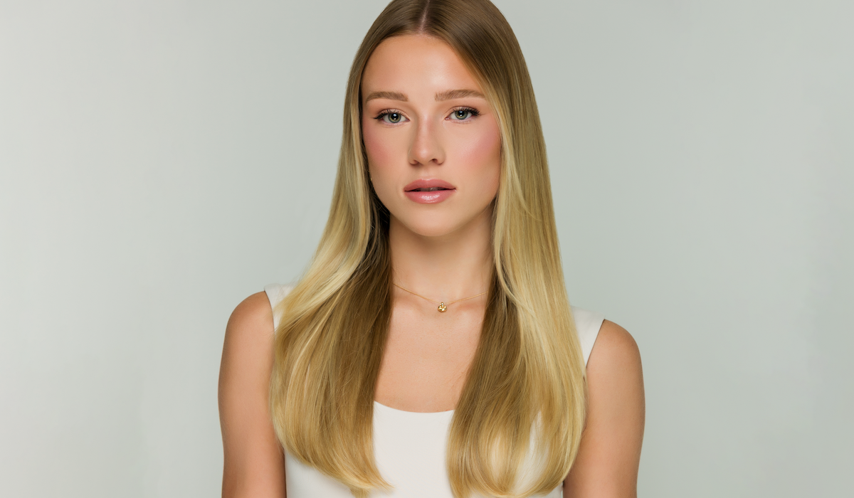 Model after wearing Camellia Oil in hair