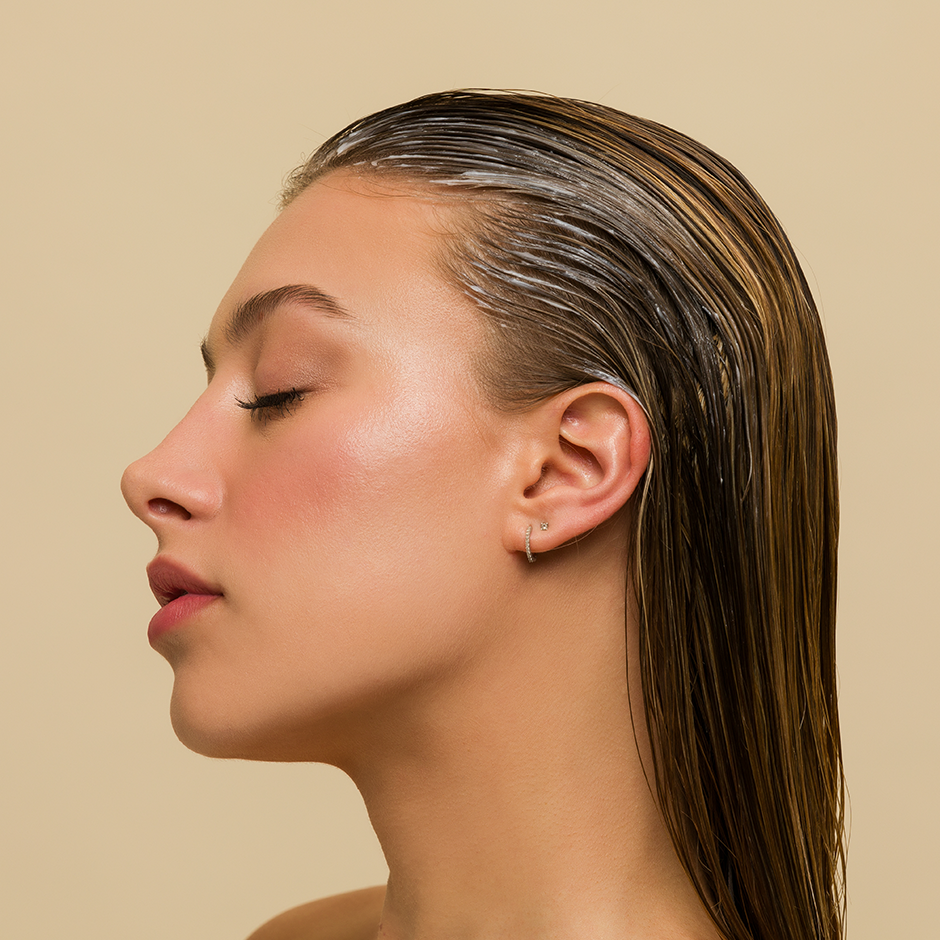 Woman with hair mask in hair