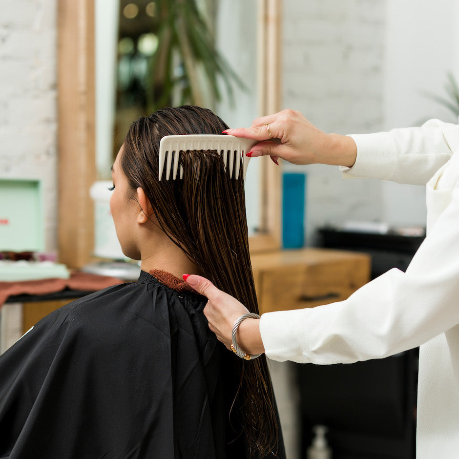 Wide Tooth Comb In Use